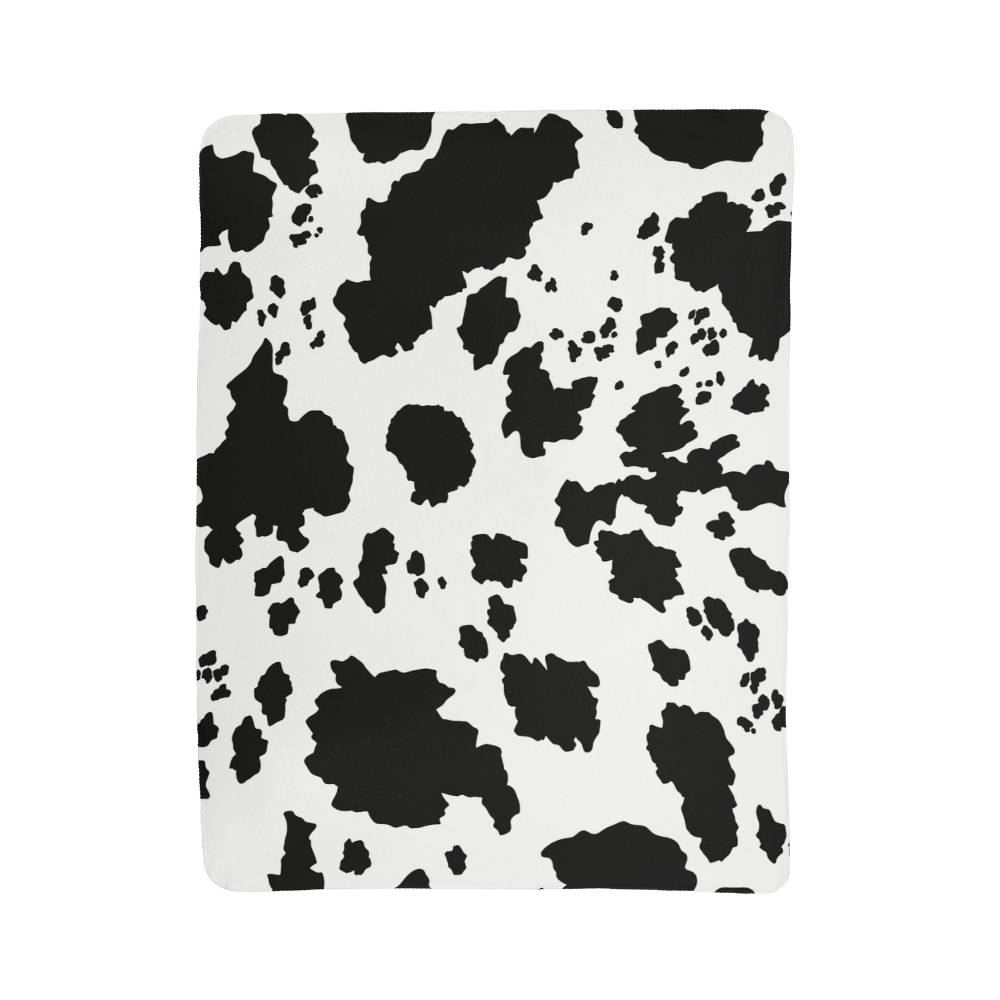 Stay Warm and Stylish with a Cow Print Blanket