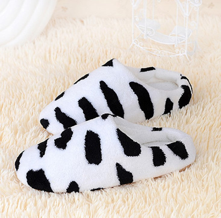 Stay Warm and Stylish with Our Cow Pattern Women Slippers