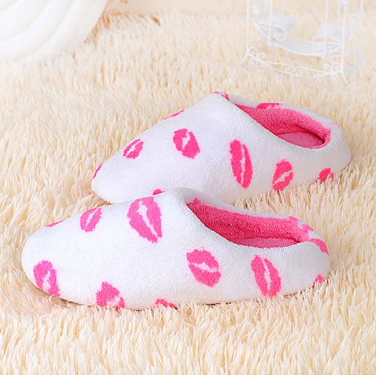 Stay Warm and Stylish with Our Cow Pattern Women Slippers