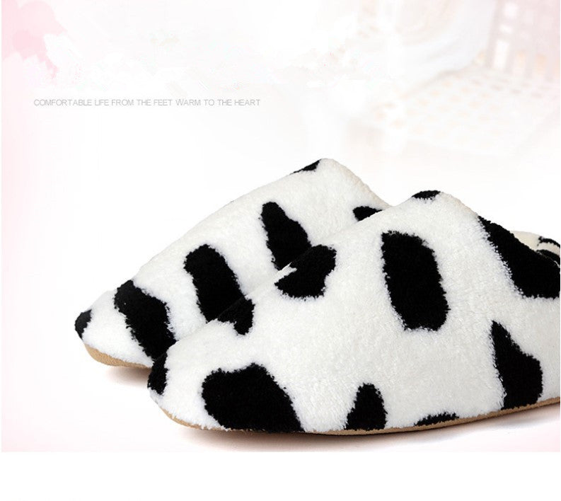 Stay Warm and Stylish with Our Cow Pattern Women Slippers