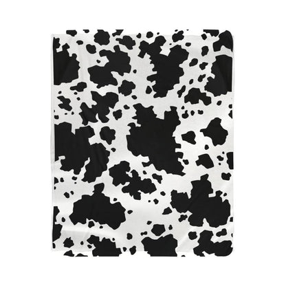 Stay Warm and Stylish with a Cow Print Blanket