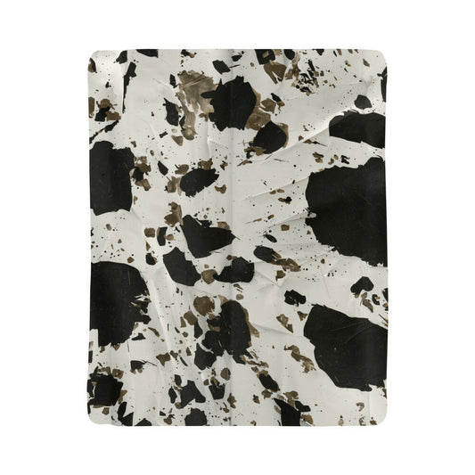 Stay Warm and Stylish with a Cow Print Blanket