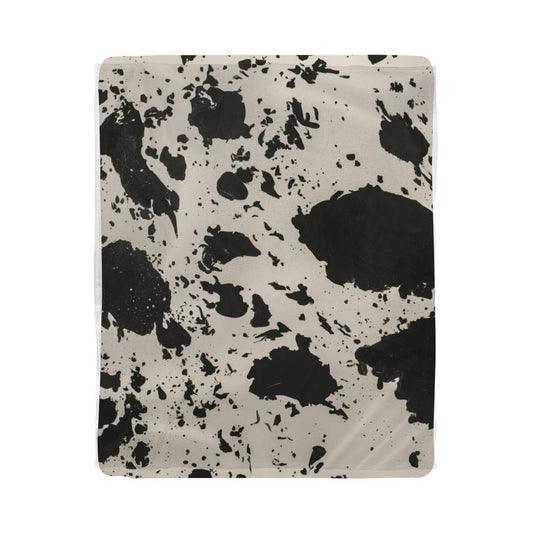 Stay Warm and Stylish with a Cow Print Blanket