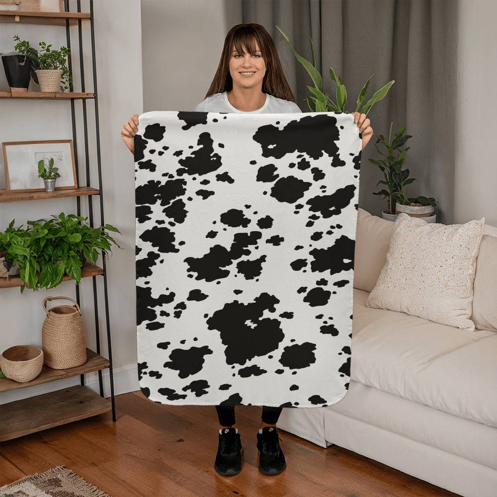 Stay Warm and Stylish with a Cow Print Blanket