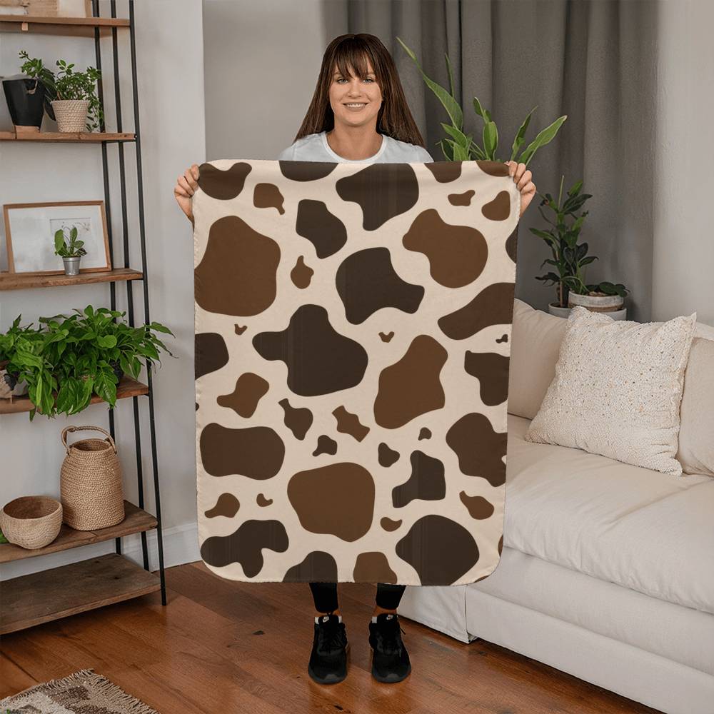 Stay Warm and Stylish with a Cow Print Blanket