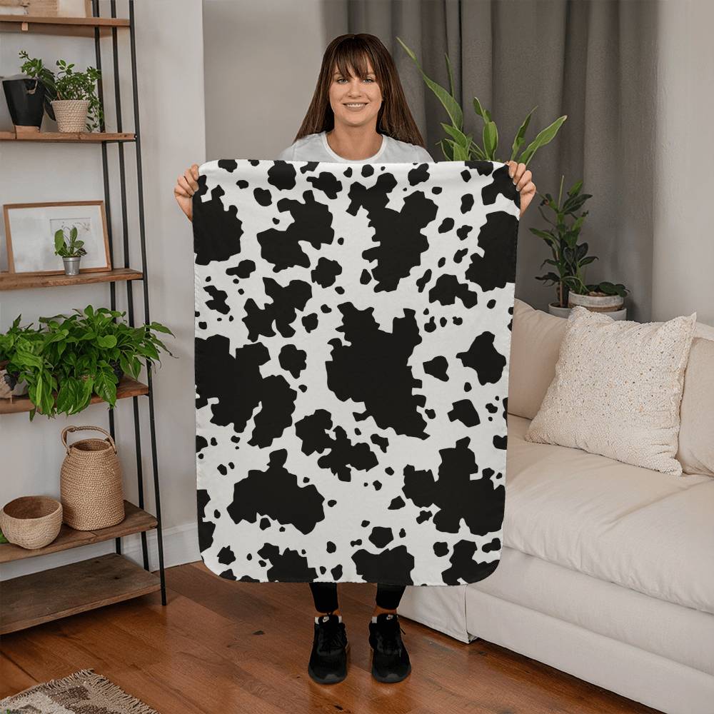 Stay Warm and Stylish with a Cow Print Blanket