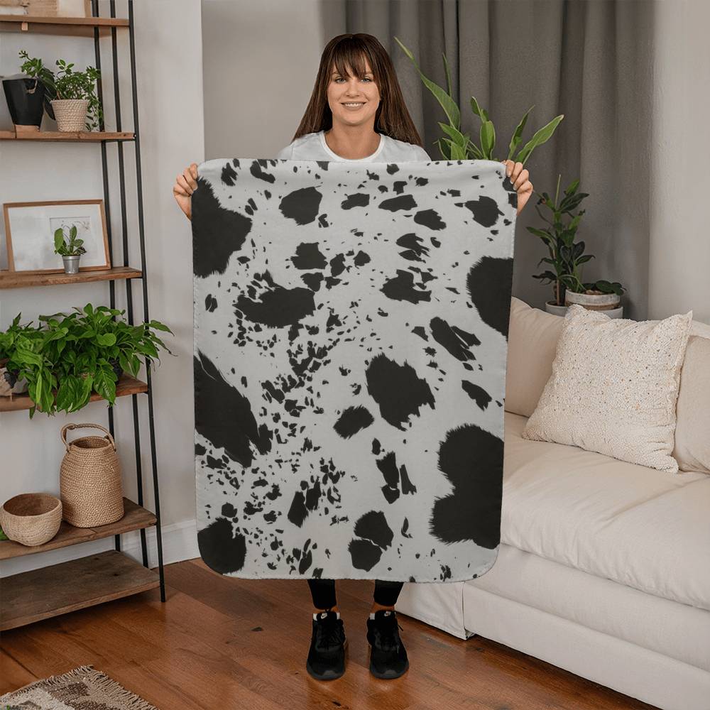 Stay Warm and Stylish with a Cow Print Blanket