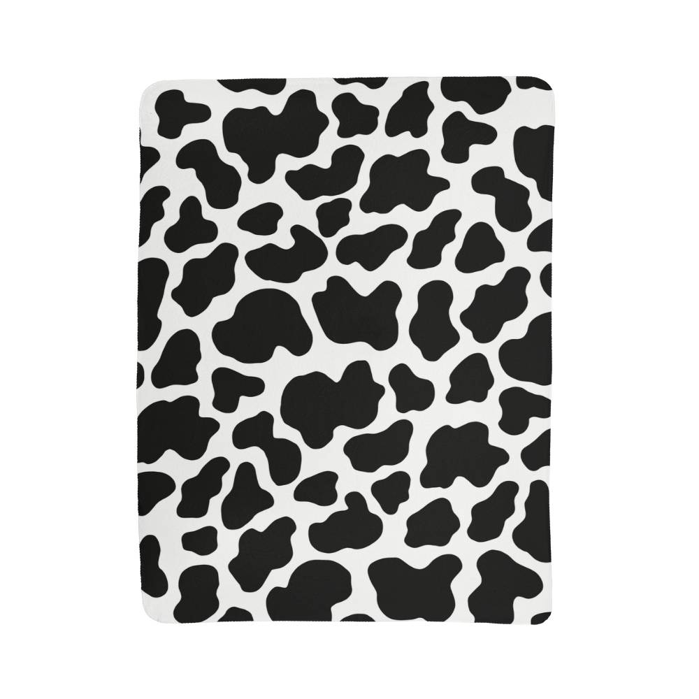 Stay Warm and Stylish with a Cow Print Blanket