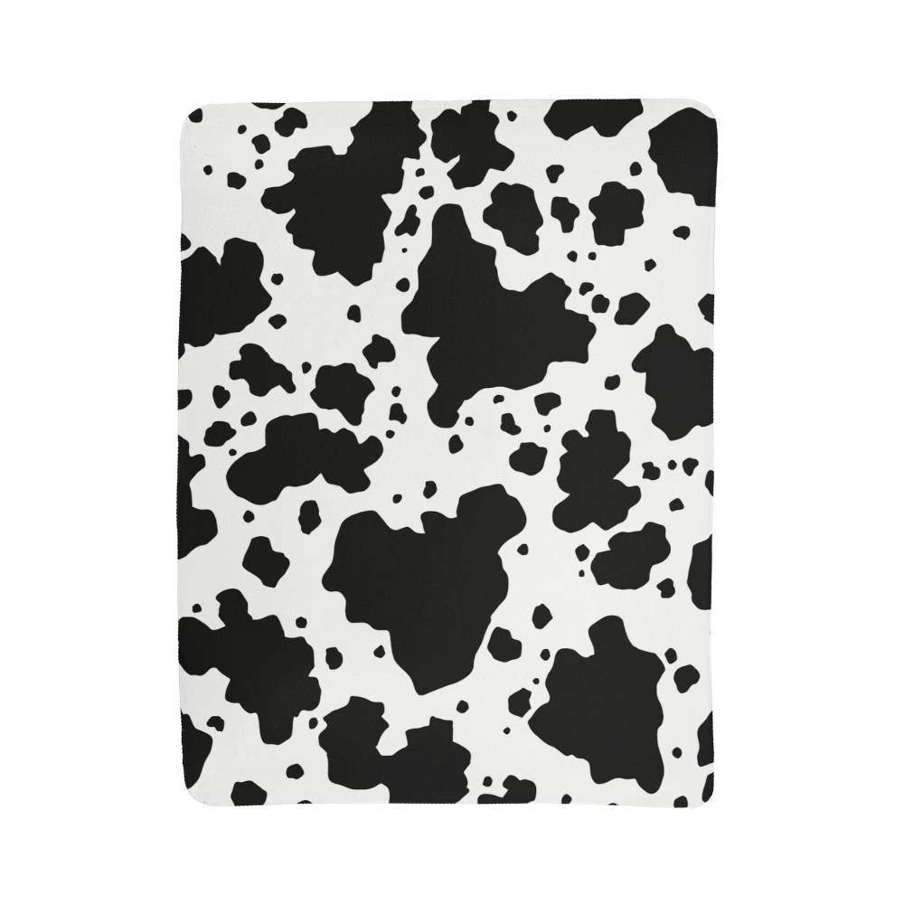 Stay Warm and Stylish with a Cow Print Blanket