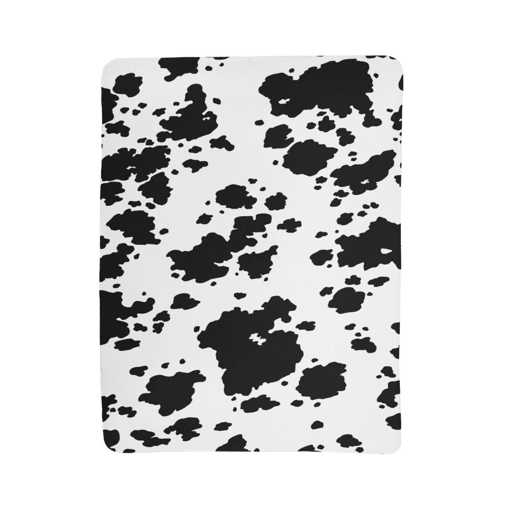 Stay Warm and Stylish with a Cow Print Blanket