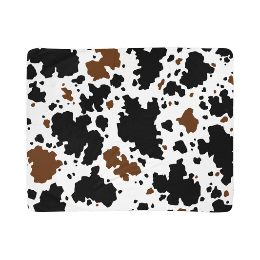 Stay Warm and Stylish with a Cow Print Blanket