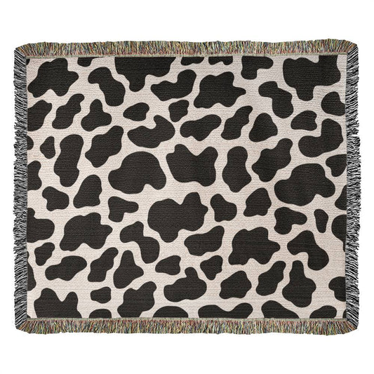 Stay Warm and Stylish with a Cow Print Blanket