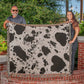 Stay Warm and Stylish with a Cow Print Blanket