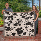 Stay Warm and Stylish with a Cow Print Blanket