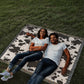 Stay Warm and Stylish with a Cow Print Blanket